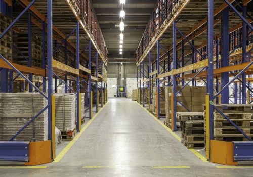 view-inside-new-warehouse-mezzanine-floor-looking-into-hall_181624-25949